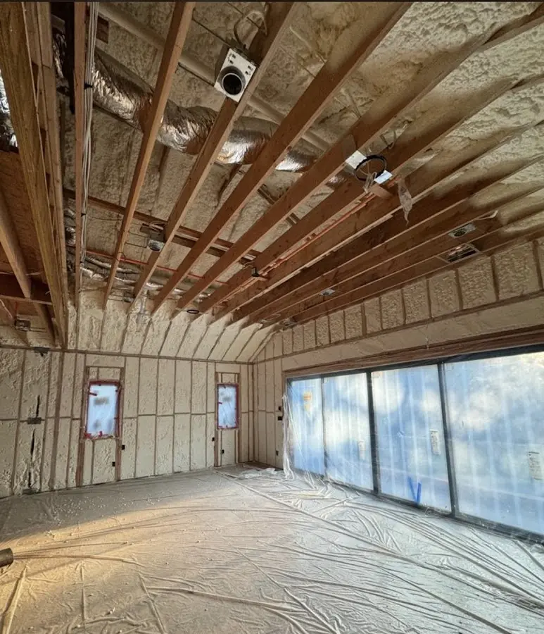 Interior walls and ceiling insulated with spray foam during new construction in Walker
